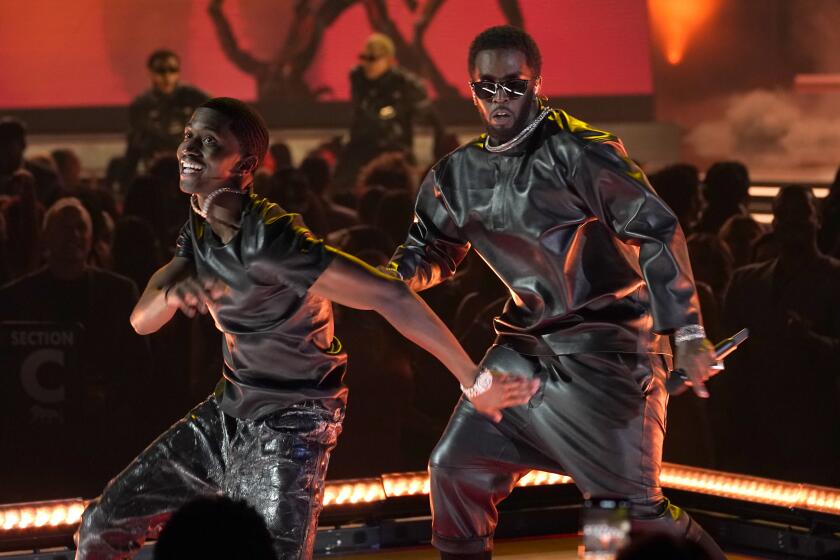 FILE - Sean "Diddy" Combs, right, and Christian Combs perform at the Billboard Music Awards, Sunday, May 15, 2022, at the MGM Grand Garden Arena in Las Vegas. (AP Photo/Chris Pizzello, File)