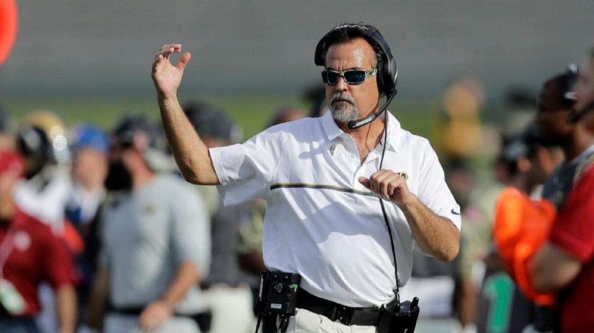 Rams Coach Jeff Fisher gestures during L.A.'s 13-10 loss to the Panthers at the Coliseum on Nov. 6.