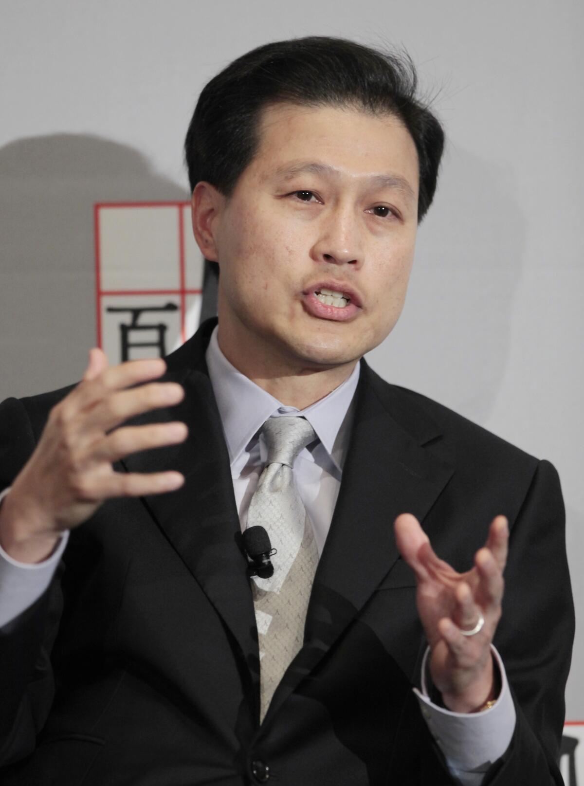 Dominic Ng, Chairman and CEO of East West Bank, speaks at a conference 
