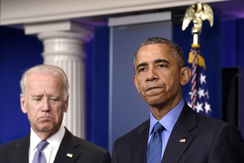 President Obama, accompanied by Vice President Joe Biden, speaks at a White House briefing on Thursday following the shootings in Charleston, S.C.