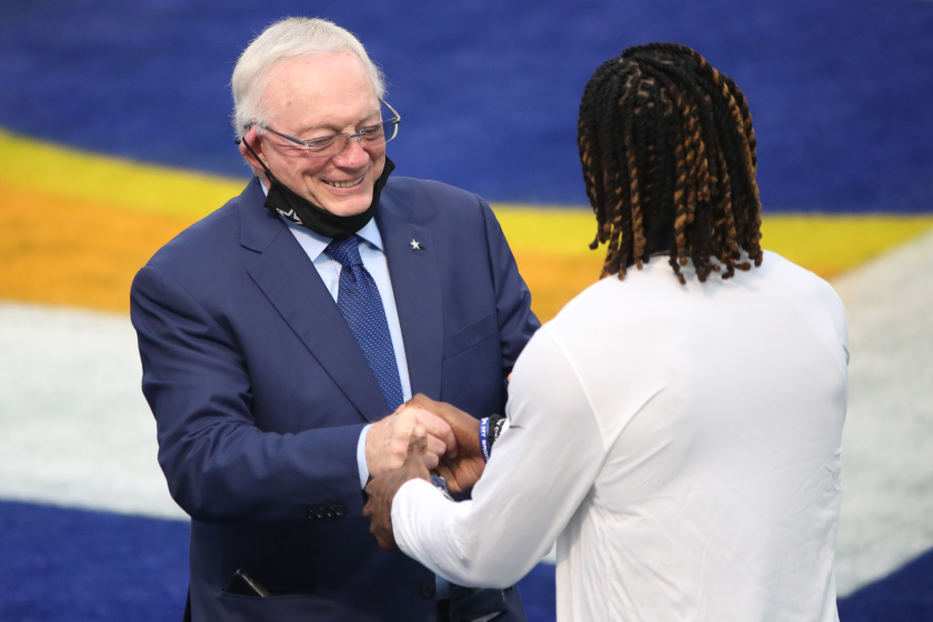 Dallas Cowboys owner Jerry Jones talks with Dallas Cowboys wide receiver CeeDee Lamb.
