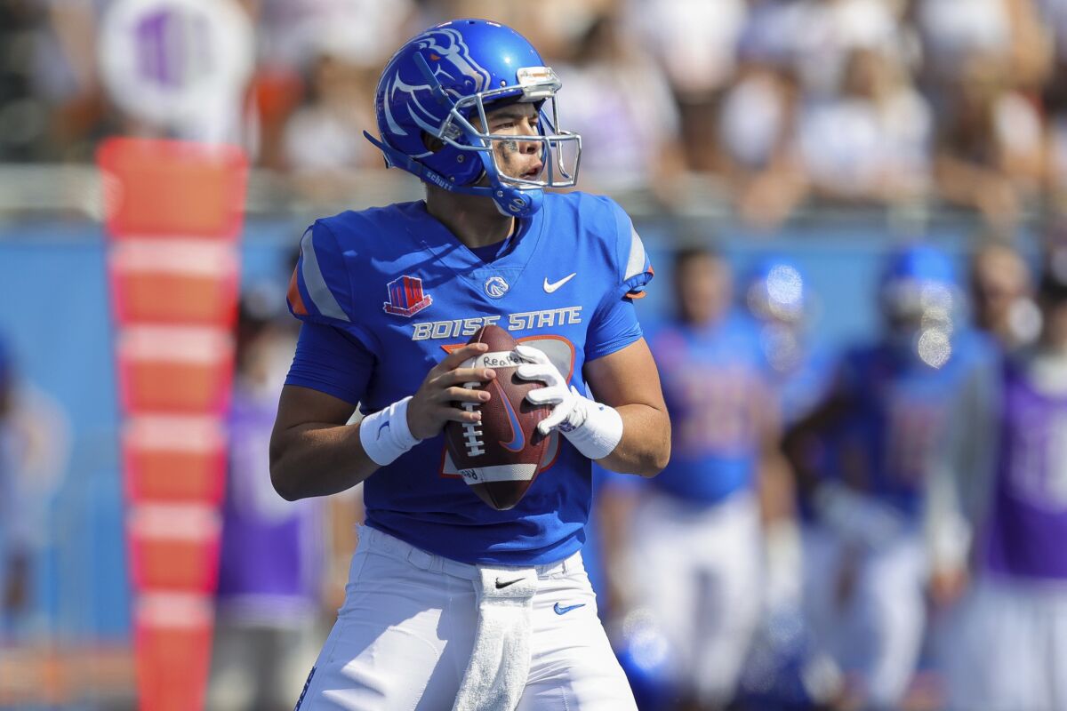 Boise State quarterback Hank Bachmeier (19) looks to throw against Tennessee-Martin in the first half of an NCAA college football game, Saturday, Sept. 17, 2022, in Boise, Idaho. (AP Photo/Steve Conner)