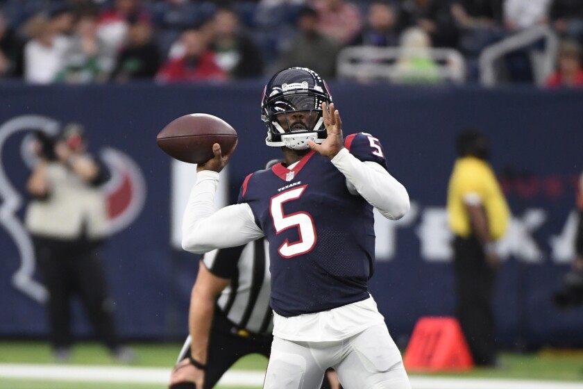 Houston Texans quarterback Tyrod Taylor (5) passes in the first half of an NFL football game in Houston, Sunday, Nov. 28, 2021. The Jets won 21-14. (AP Photo/Justin Rex)