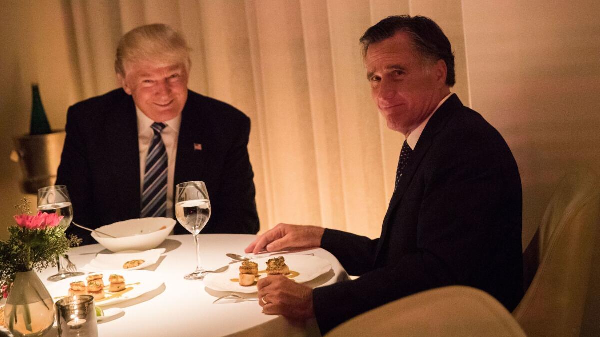 Donald Trump and Mitt Romney dine in New York on Nov. 29, 2016, as Trump was pondering whether to add his longtime opponent to his Cabinet.