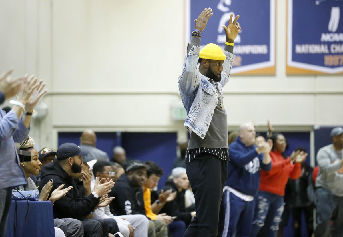 Lakers star LeBron James celebrates March 7, 2020, at the playoff game between Sierra Canyon and Harvard-Westlake at Pepperdine.
