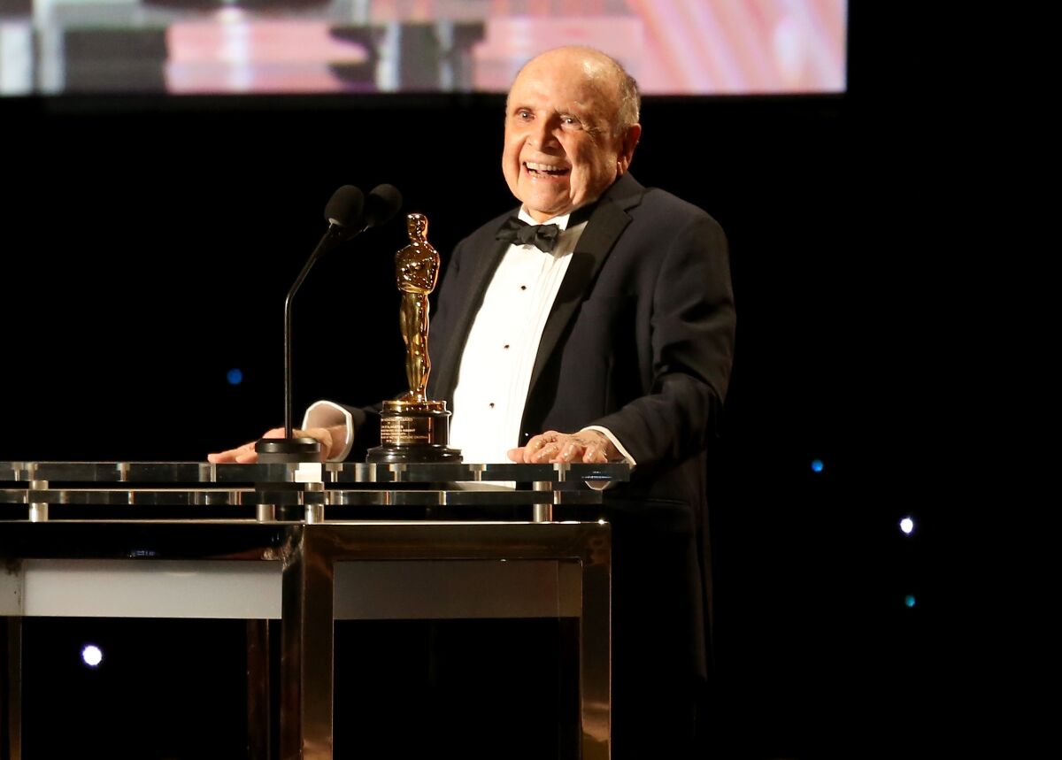 Lynn Stalmaster accepts his award  during the Academy of Motion Picture Arts and Sciences.