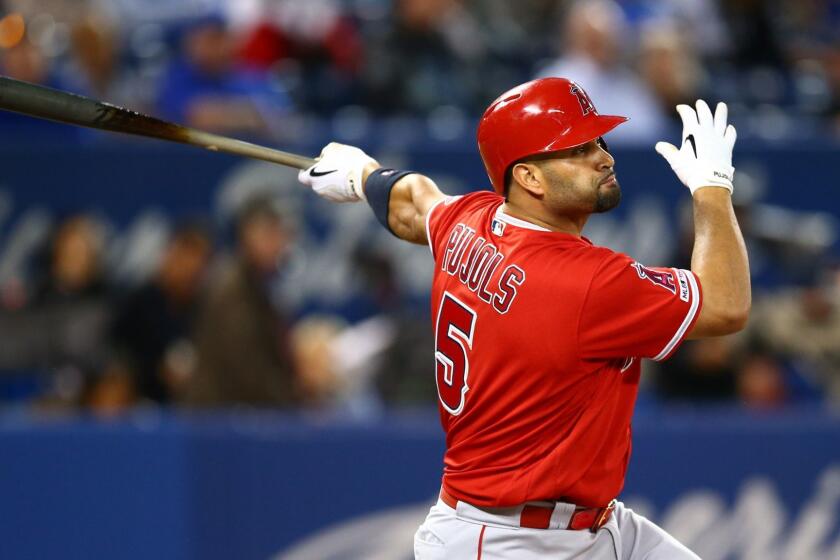 TORONTO, ON - JUNE 18: Albert Pujols #5 of the Los Angeles Angels of Anaheim singles in the ninth inning during a MLB game against the Toronto Blue Jays at Rogers Centre on June 18, 2019 in Toronto, Canada. (Photo by Vaughn Ridley/Getty Images) ** OUTS - ELSENT, FPG, CM - OUTS * NM, PH, VA if sourced by CT, LA or MoD **