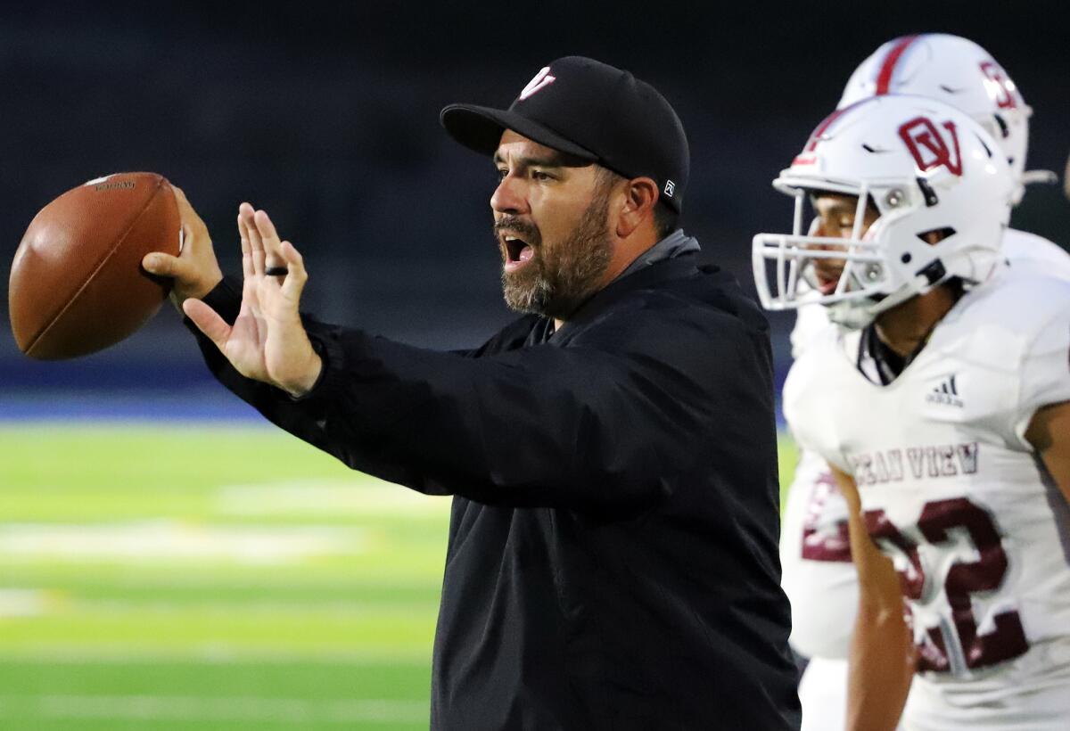 Ocean View's first-year head coach Daniel Hernandez coaches his team against Gahr on Friday.