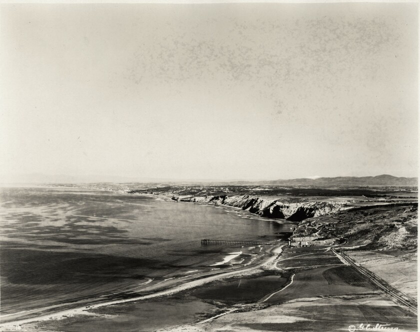 The Scripps Pier, pictured in 1923, was contracted by Ellen Browning Scripps in May 1915. It was replaced in 1988.