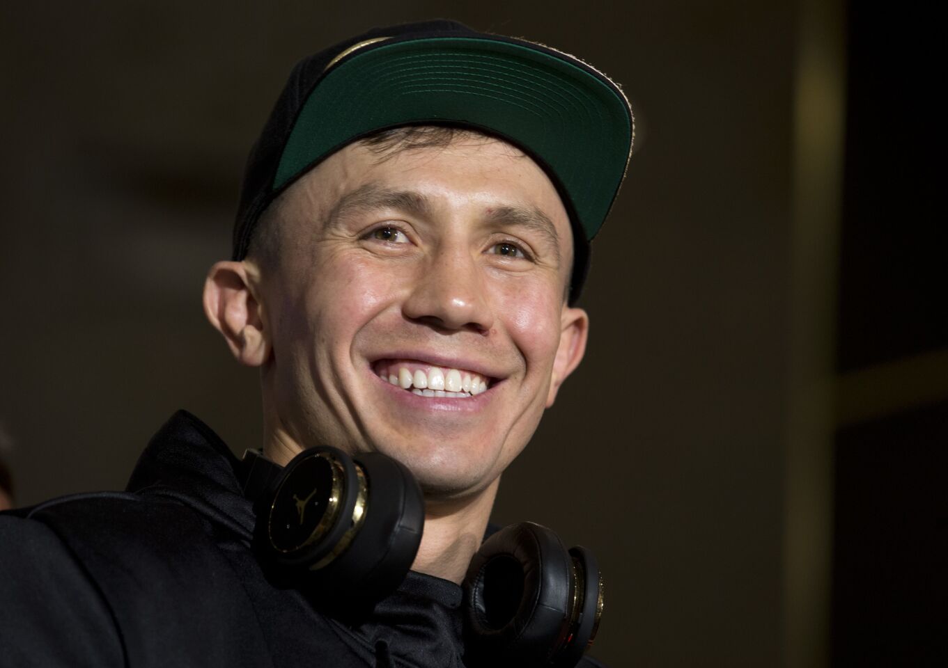 WBC/WBA middleweight boxing champion Gennady Golovkin of Kazakhstan smiles after arriving at the MGM Grand hotel-casino in Las Vegas Tuesday, Sept. 11, 2018. Golovkin will defend his titles against Canelo Alvarez of Mexico in a rematch at T-Mobile Arena in Las Vegas on Sept. 15. (Steve Marcus/Las Vegas Sun via AP)