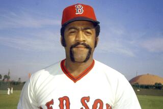 FILE - Boston Red Sox pitcher Luis Tiant is pictured in 1974. (AP Photo/Phil Sandlin, File)