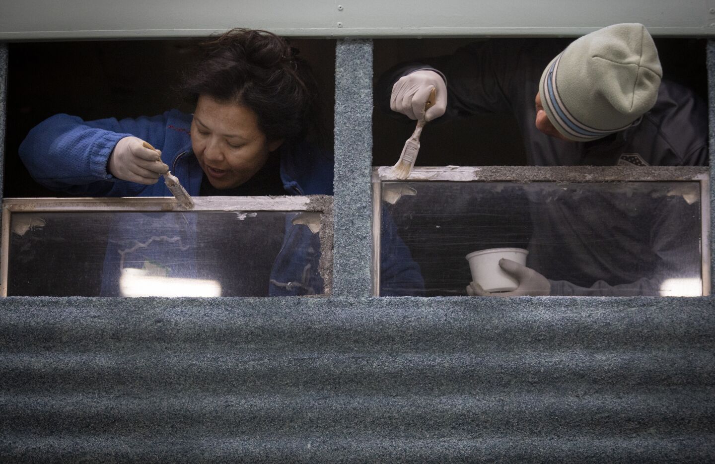 Ruby Carrier and Robert Gutierrez work on the Amazon Studios' float