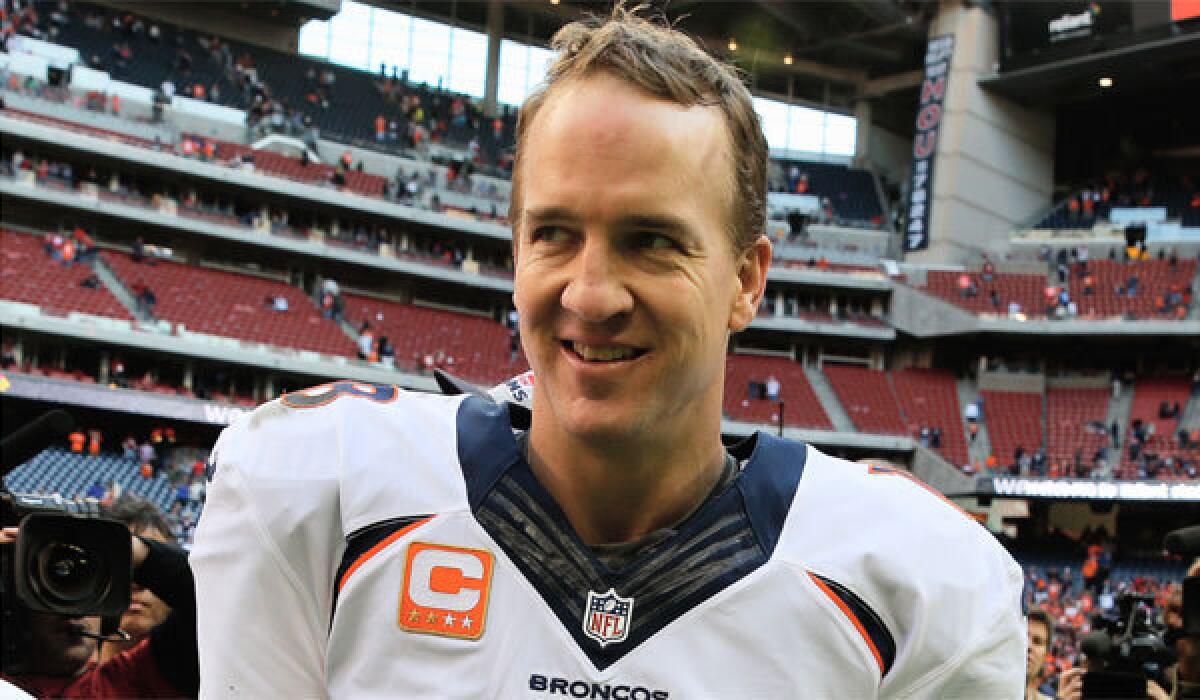 Denver quarterback Peyton Manning set a record for most touchdown passes in a season on Sunday.