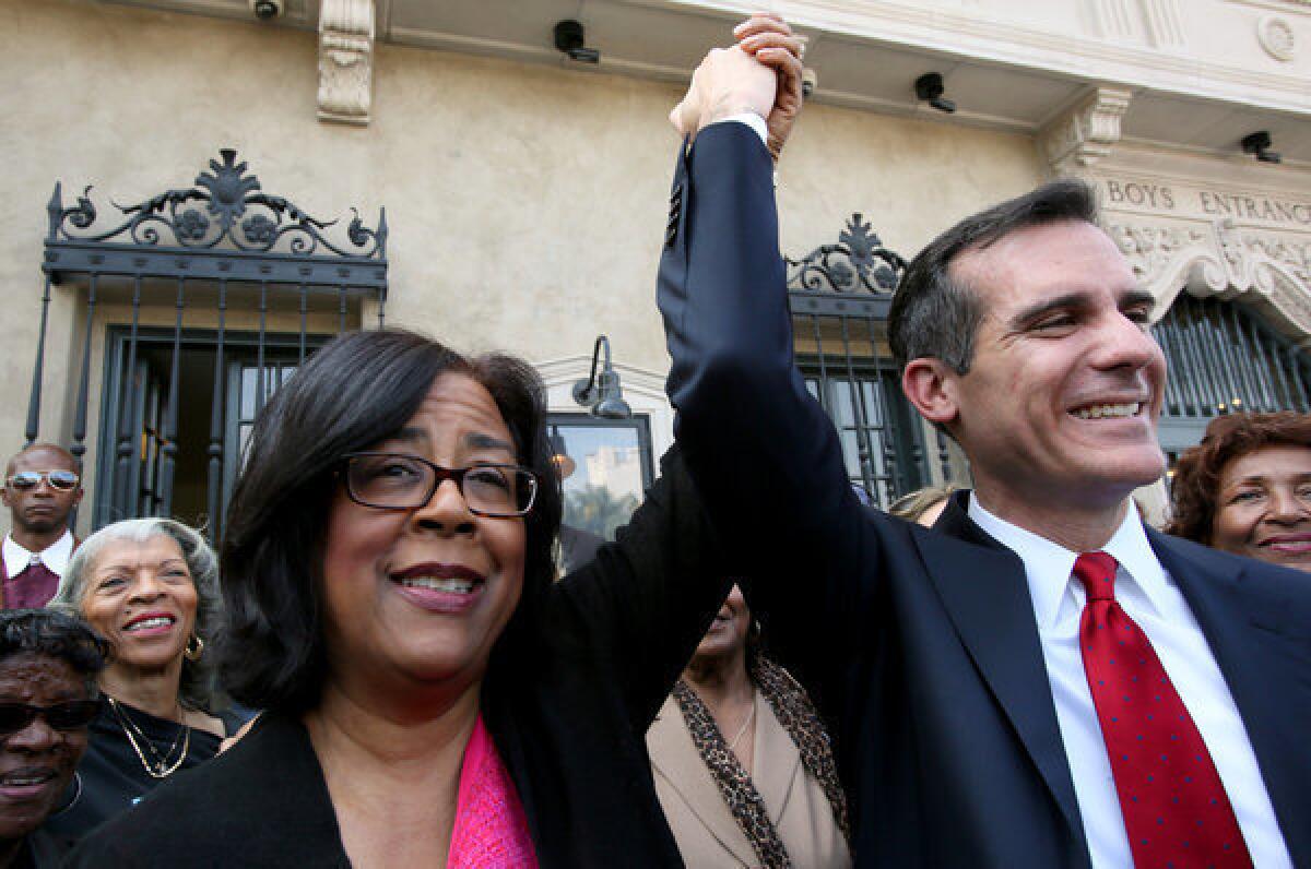 Councilwoman Jan Perry endorses mayoral candidate Eric Garcetti at a news conference on the steps of the YMCA in Los Angeles.