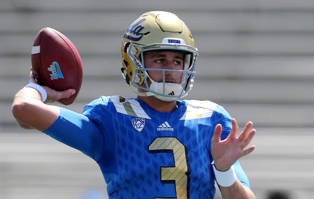 UCLA quarterback Josh Rosen warms up before the game against Virginia at the Rose Bowl.