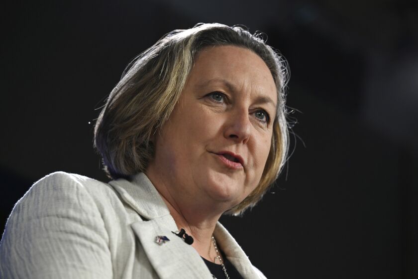 British Minister of State for Indo-Pacific Anne-Marie Trevelyan speaks at the National Press Club in Canberra, Monday, Nov. 28, 2022. Australia's shift to nuclear-powered submarines would assure its South Pacific neighbors of the nation's commitment to regional security Trevelyan says. (Mick Tsikas/AAP Image via AP)