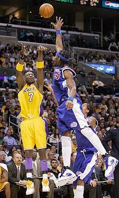 Lakers' Lamar Odom shoots over Clipper Chris Wilcox during the first half.
