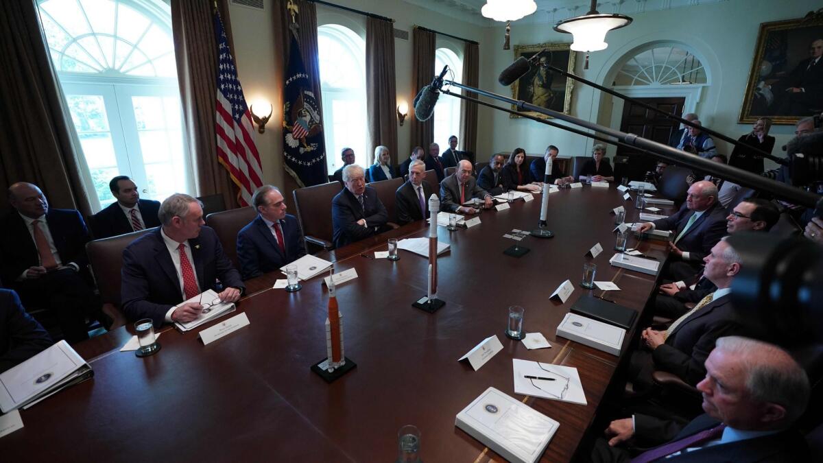 President Donald Trump speaks during a Cabinet meeting at the White House on March 8.