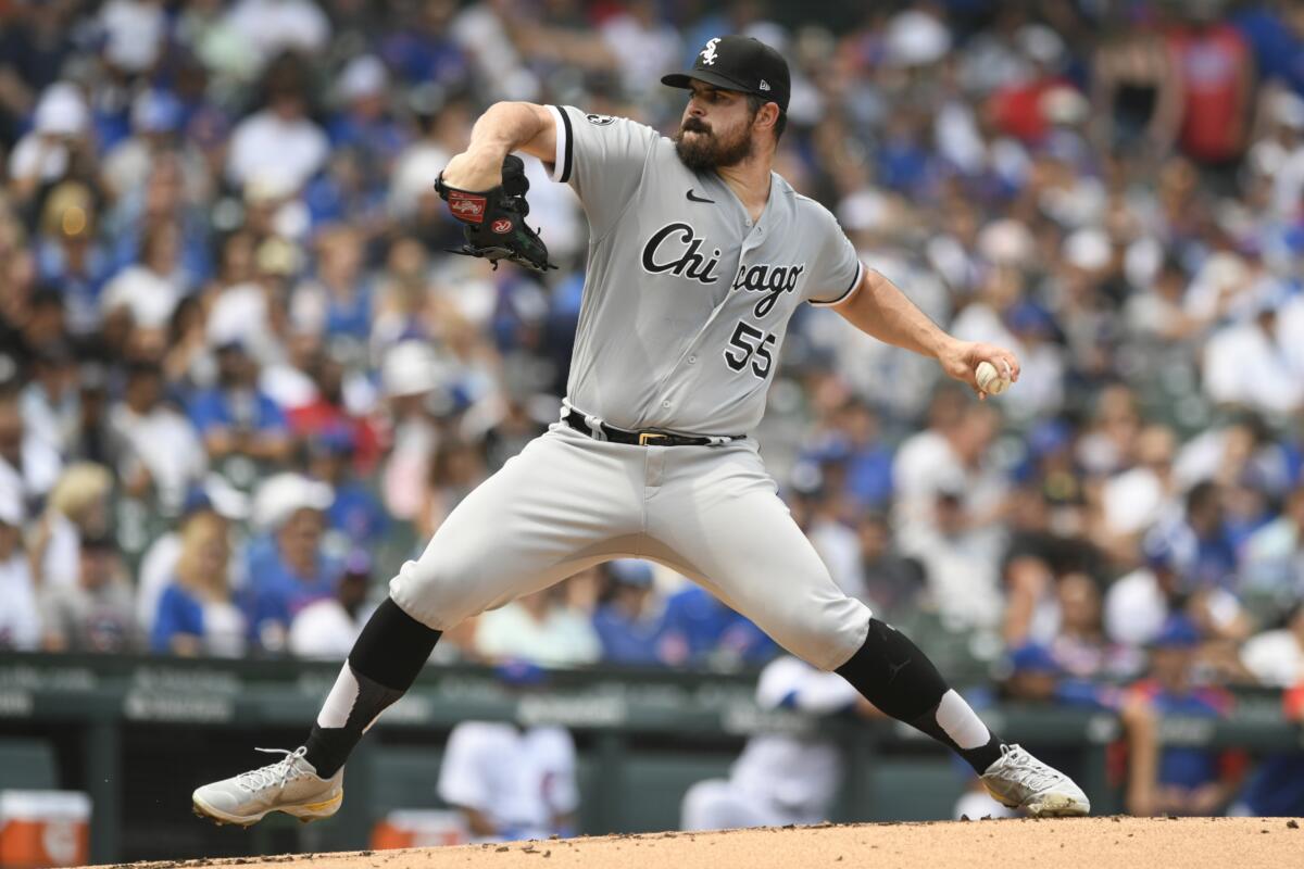 Chicago White Sox starter Carlos Rodon delivers a pitch during the first inning of a baseball game against the Chicago Cubs Saturday, Aug 7, 2021, in Chicago. (AP Photo/Paul Beaty)