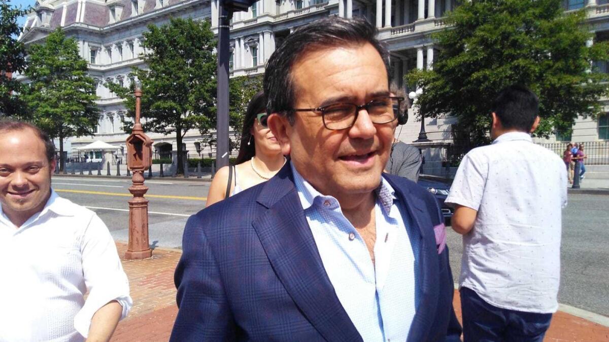 Mexican Economy Minister Ildefonso Guajardo leaves the office of the U.S. Trade Representative during a lunch break between meetings on NAFTA on Sunday in Washington.