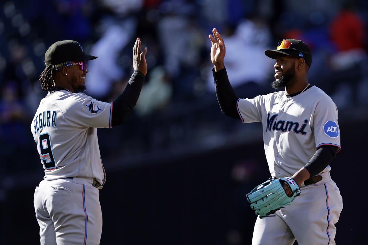 Dietrich's RBI triple in 9th helps Marlins beat Cards 5-4 - The San Diego  Union-Tribune