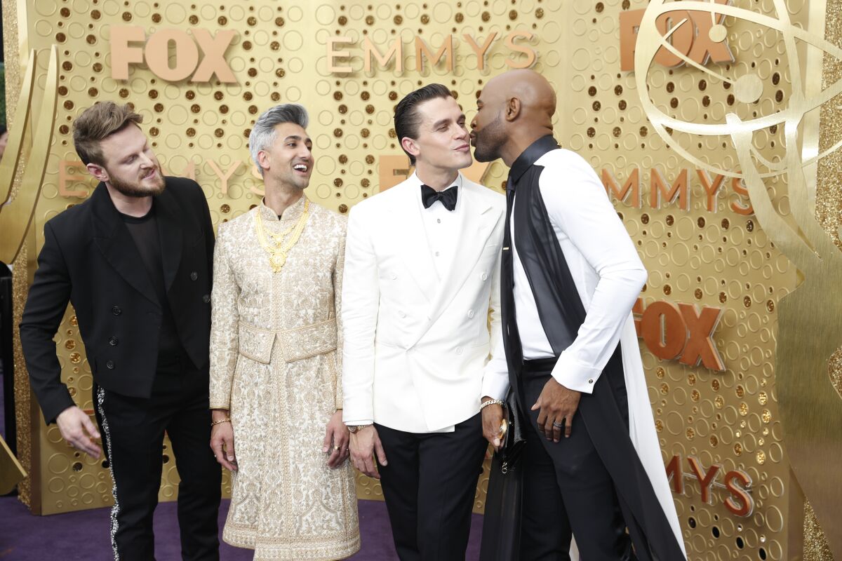 Bobby Berk, left, Tan France, Antoni Porowski and Karamo Brown of "Queer Eye" at the 71st Primetime Emmy Awards. Absent was show cast member Jonathan Van Ness.