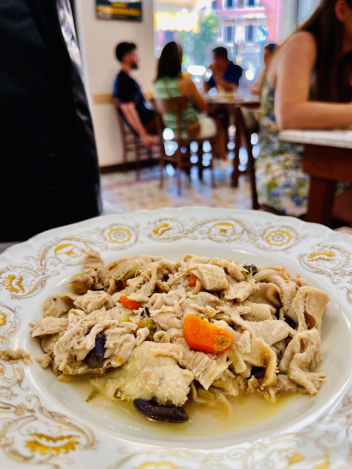 Sheep tripe with capers, anchovies, vinegar, rosemary, olives and onion at Santo Palato in Rome.