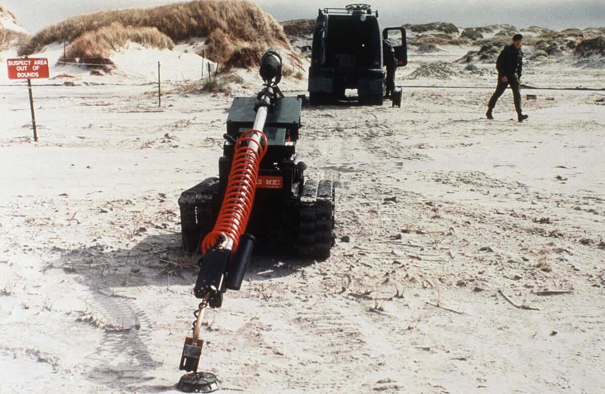 A robot undergoes testing in a mine-clearance operation by British troops in the Falkland Islands in 1985.