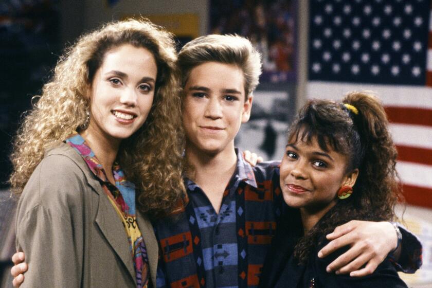 Pictured: (l-r) Elizabeth Berkley as Jessie Spano, Mark-Paul Gosselaar as Zack Morris, Lark Voorhies as Lisa Turtle 