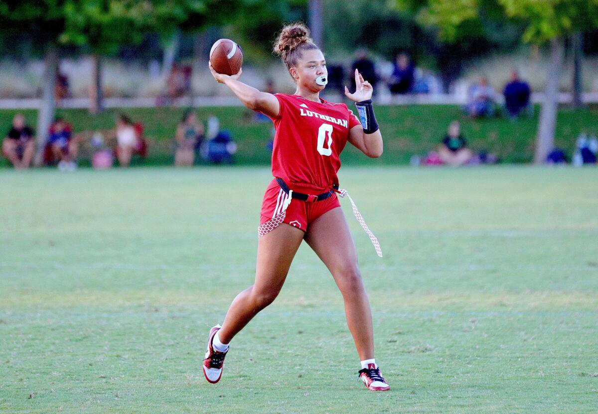 Orange Lutheran quarterback Makena Cook throws a pass during a game against Eastvale Roosevelt on Sept. 5.