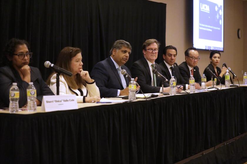LOS ANGELES, CA - APRIL 27, 2022 - - Los Angeles City Attorney candidates Sherri Monica Valle Cole, from left, Hydee Feldstein Soto, Faisal Gill, Kevin James, Teddy Kapur, Richard Kim and Marina Torres participate in a forum in the Student Union at California State University, Los Angeles on April 27, 2022.The forum was presented by the Los Angeles Bar Association with The Criminal Justice Section and Co-Sponsors. (Genaro Molina / Los Angeles Times)
