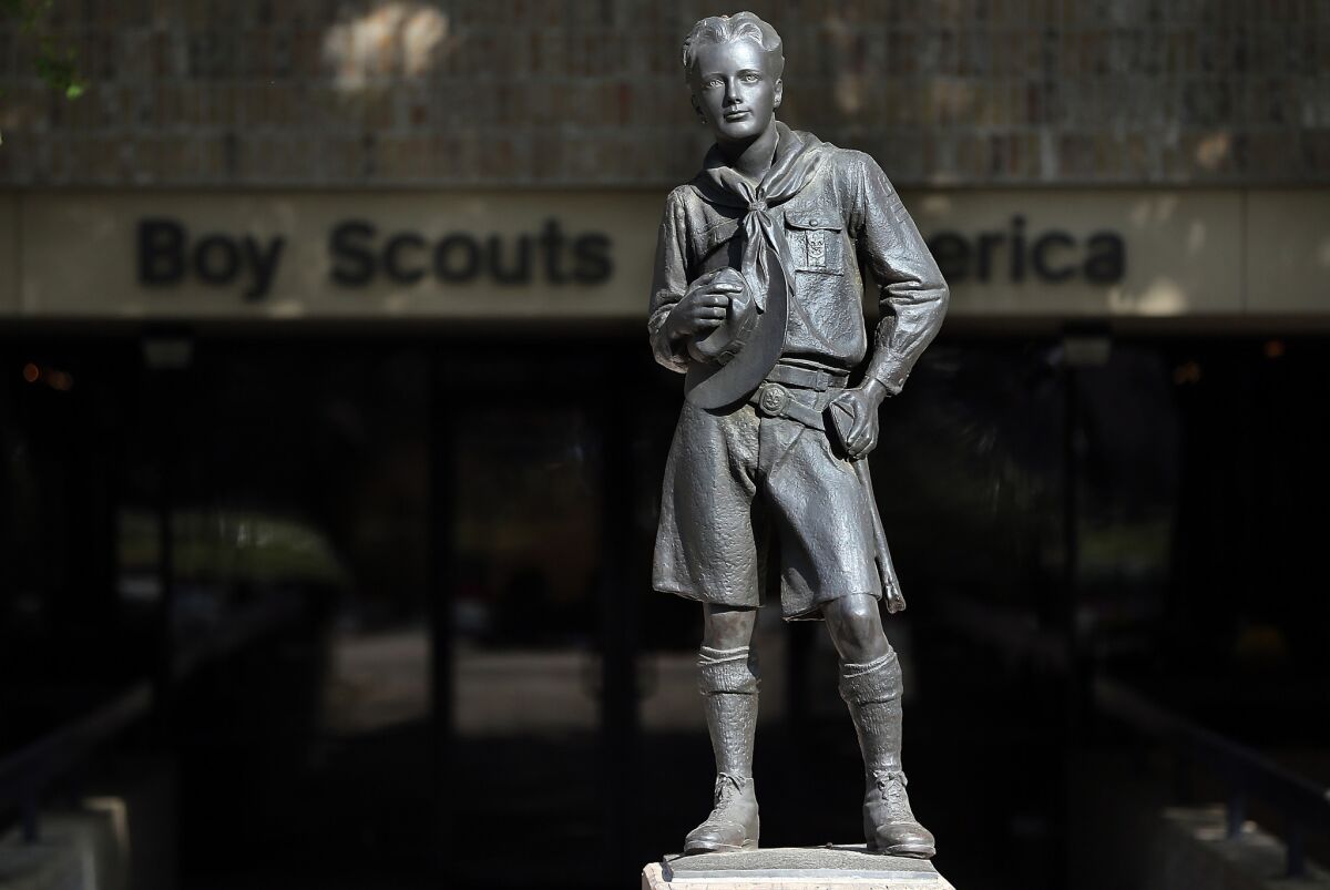 A statue of a Scout stands outside the Boy Scouts of America offices in Irving, Texas.