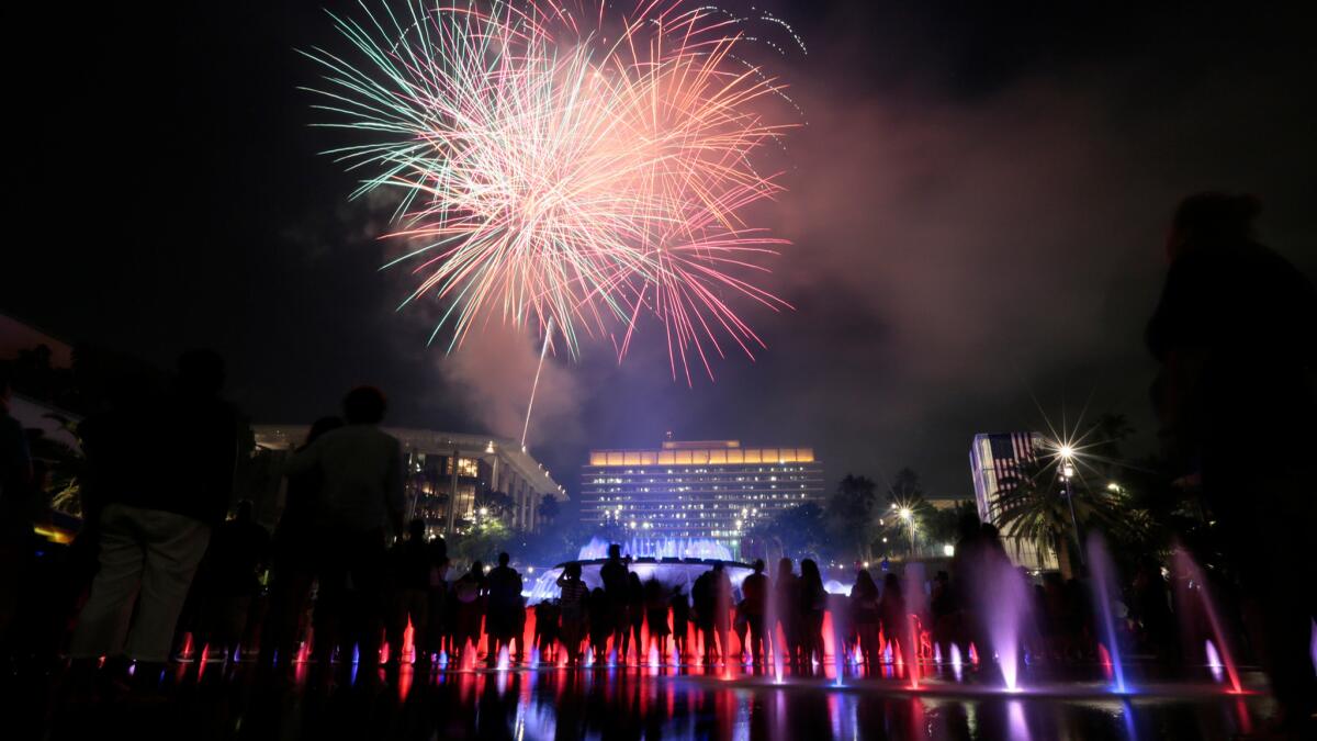 Fireworks explode over the Dorothy Chandler Pavillion during a Fourth of July celebration in downtown Los Angeles in 2014.