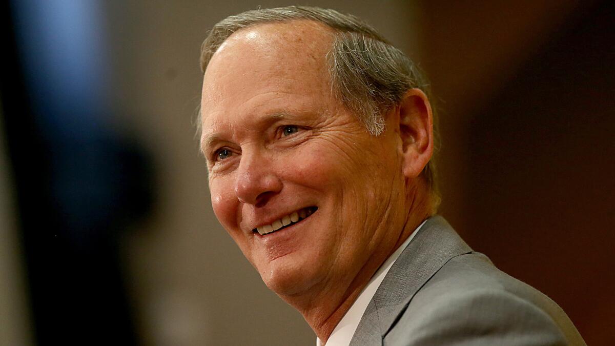 USC Athletic Director Pat Haden smiles as he speaks at an introductory news conference for football coach Steve Sarkisian in December. Haden says everyone involved in USC's sports programs needs to be vigilant when it comes to athletic compliance.