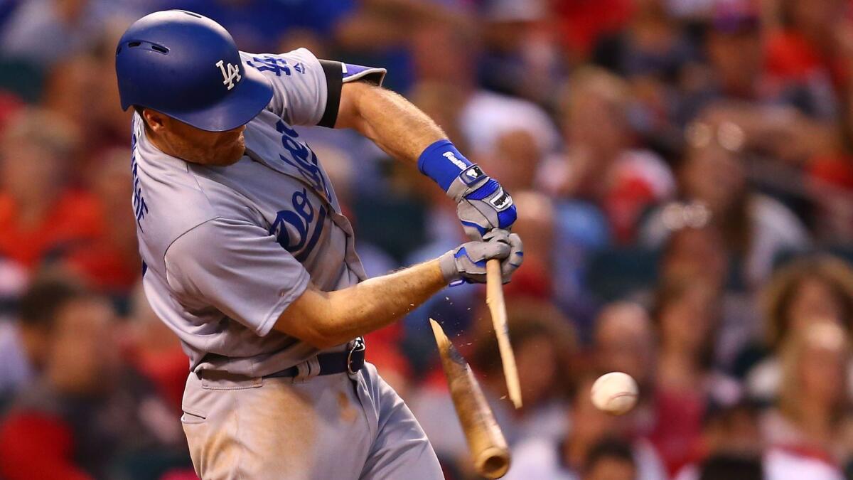Dodgers' Logan Forsythe breaks his bat but knocks in a run against St. Louis on May 30.