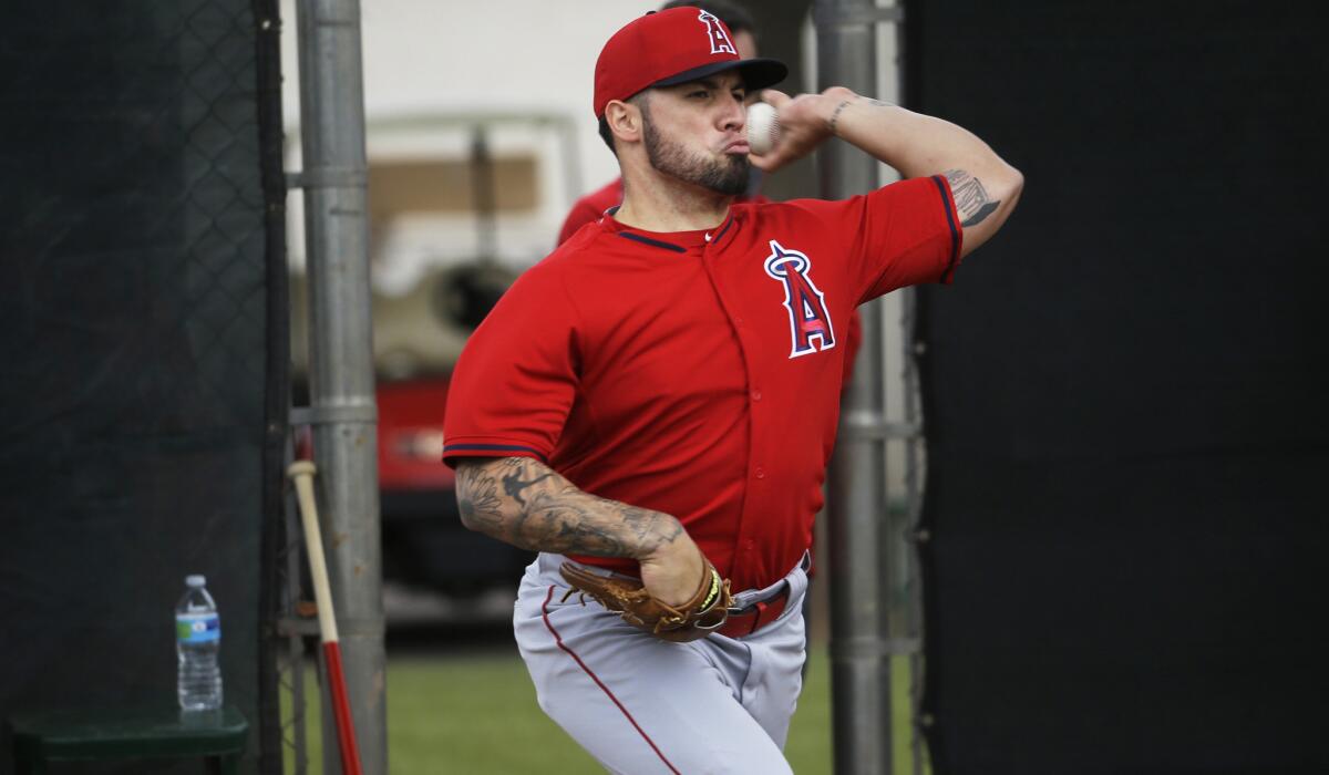Angels pitcher Hector Santiago throws during a during a training session on Friday in Tempe, Ariz.