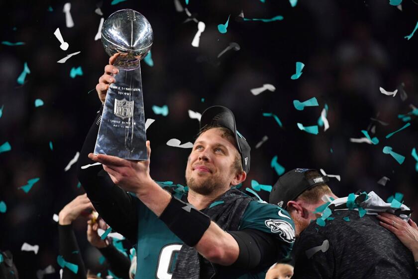 TOPSHOT - Philadelphia Eagles quarterback Nick Foles celebrates after winning Super Bowl LII against the New England Patriots at US Bank Stadium in Minneapolis, Minnesota, on February 4, 2018. The Eagles won 41-33 / AFP PHOTO / TIMOTHY A. CLARYTIMOTHY A. CLARY/AFP/Getty Images ** OUTS - ELSENT, FPG, CM - OUTS * NM, PH, VA if sourced by CT, LA or MoD **