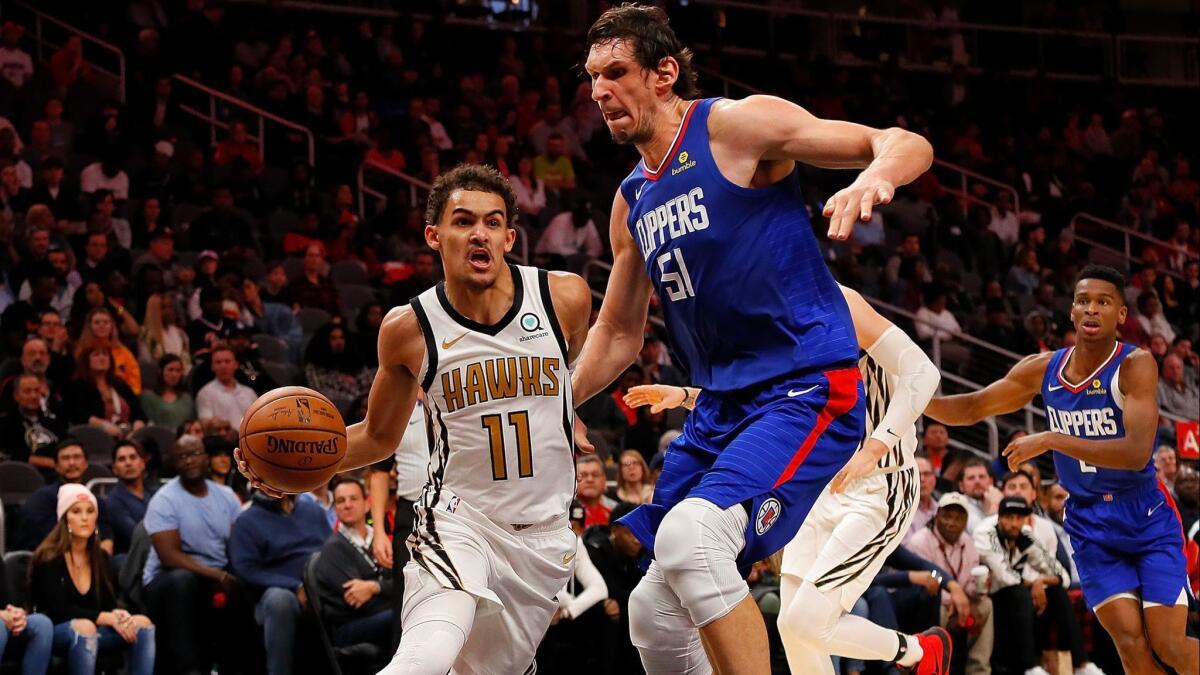 Boban Marjanovic, playing for the first time in four games Monday in Atlanta, entered in the third quarter against Trae Young and the Hawks and helped spark a 10-0 run to give the Clippers the lead.