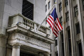 The U.S. flag flies over the side entrance to the New York Stock Exchange in New York Tuesday, July 18, 2023. Stocks of several financial titans are leading Wall Street higher Tuesday following some mixed reports on the economy. (AP Photo/J. David Ake)