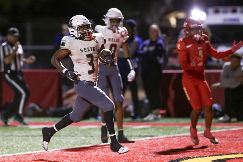 SAN DIEGO, CA - SEPTEMBER 15, 2023: Helix's Kevin Allen runs in for a touchdown during the third quarter against Cathedral Catholic at Cathedral Catholic High School in San Diego on Friday, September 15, 2023. (Hayne Palmour IV / For The San Diego Union-Tribune)
