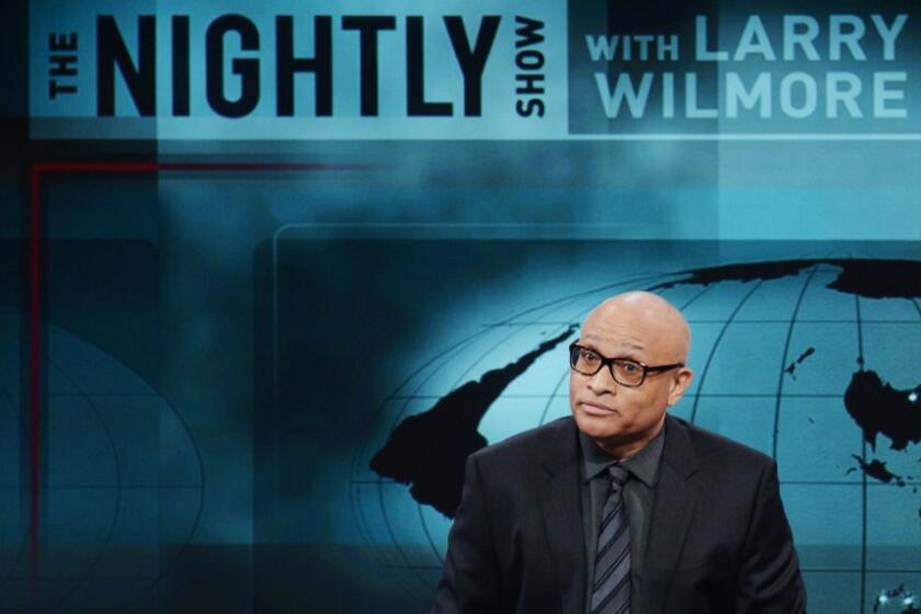 Host Larry Wilmore is shown in the debut episode of Comedy Central's "The Nightly Show" on Jan. 19, 2015. The network says it's canceling the late-night show.