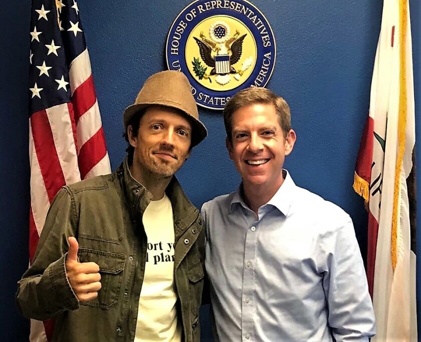 Jason Mraz, left, met with his 49th Congressional District legislator Mike Levin, D- CA, right, Wednesday to ask him to support music creators' rights.