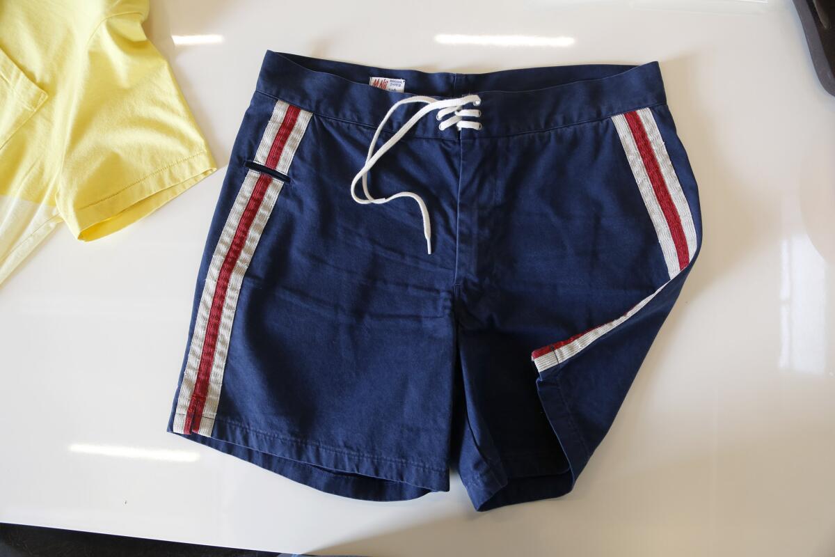 John Moore and his L.A.-based luxe retro-surf label M.Nii. Moore was recently named by GQ as one of the best new menswear designers in America for 2014. Picture are blue board shorts.