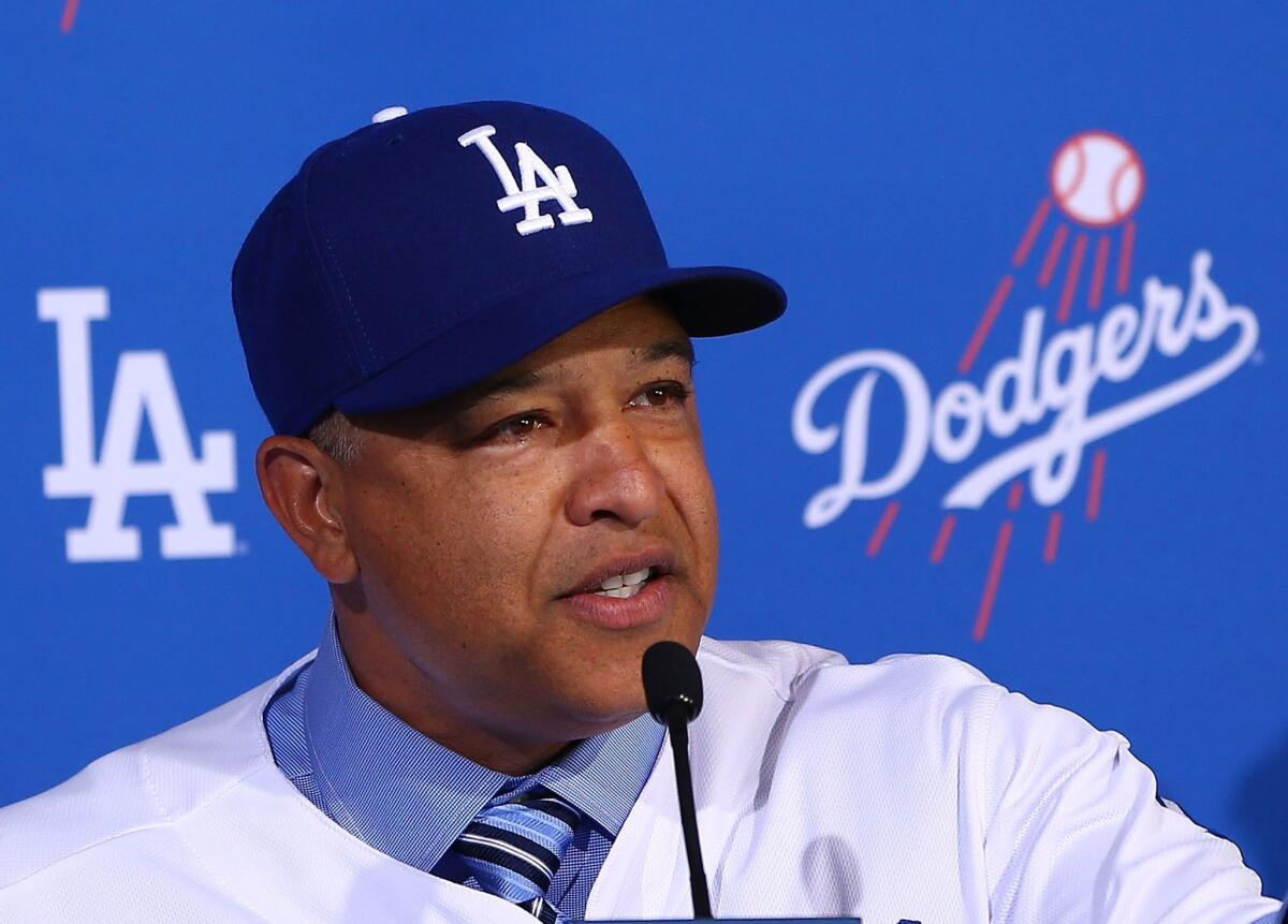 Dave Roberts speaks during a news conference to introduce him as the new Dodgers manager on Tuesday.