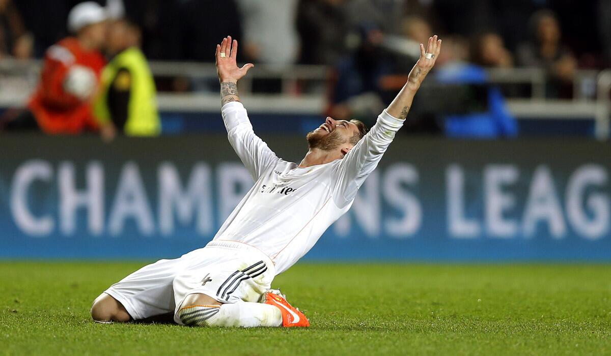 Real Madrid's Sergio Ramos, who scored the tying goal at the end of stoppage time, reacts after hearing the final whistle in the Champions League final on Saturday in Lisbon.