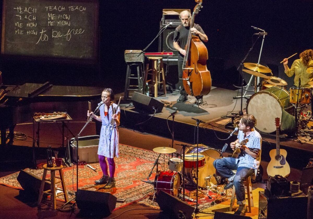 Left to right: Fiona Apple, Sebastian Steinberg on bass, Blake Mills on guitar and Barbara Gruska on drums, at Walt Disney Concert Hall on Monday.