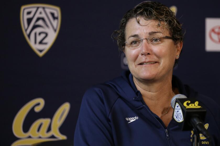 University of California at Berkeley women's swimming coach Teri McKeever answers questions during a media conference Tuesday, Feb. 17, 2015, in Berkeley, Calif. Missy Franklin is downright giddy about her two seasons swimming collegiately for California, even if it meant the delay of big-money endorsement deals that will come in a matter of months as she turns pro and gears up for the 2016 Rio de Janeiro Olympics. Franklin will soon wrap up her sophomore season in Berkeley with the Pac-12 meet and NCAAs, then quickly turn her attention toward training for this summer’s world championships in Russia and another Olympics after she captured four gold medals in her Olympic debut at the 2012 London Games when just 17. (AP Photo/Ben Margot)