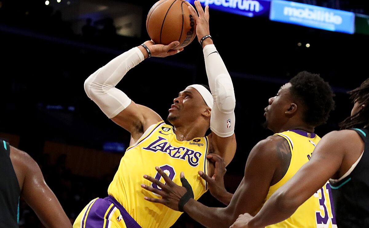 Lakers guard Russell Westbrook pulls up for a fadeaway shot in the lane.
