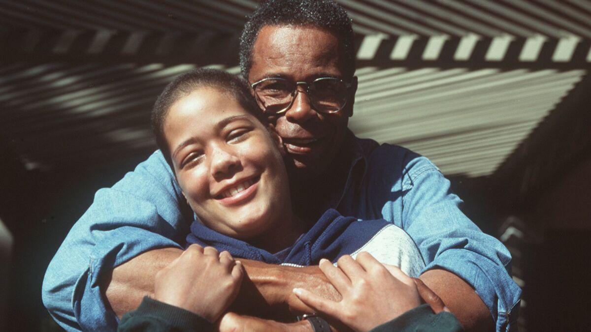 Michelle Carew, shown with her father, Rod, died in 1996 at age 18.