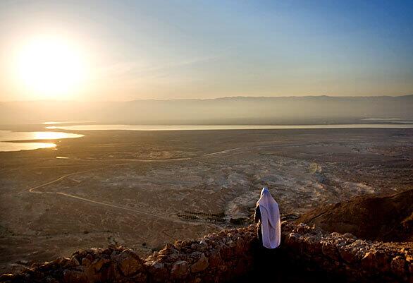 An ultra-Orthodox man participates in a special prayer at the site of the Masada fortress overlooking the Dead Sea in Israel. Devout Jews around the world today observed a ritual performed only once every 28 years, saying their morning prayers under the open sky in the "blessing of the sun."